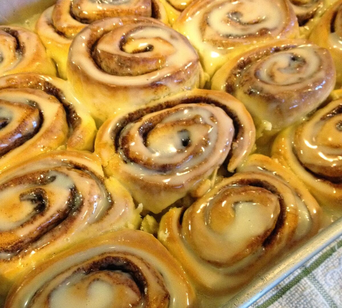 Rolled Cinnamon Rolls filled with butter, cinnamon and sugar, and drenched in icing