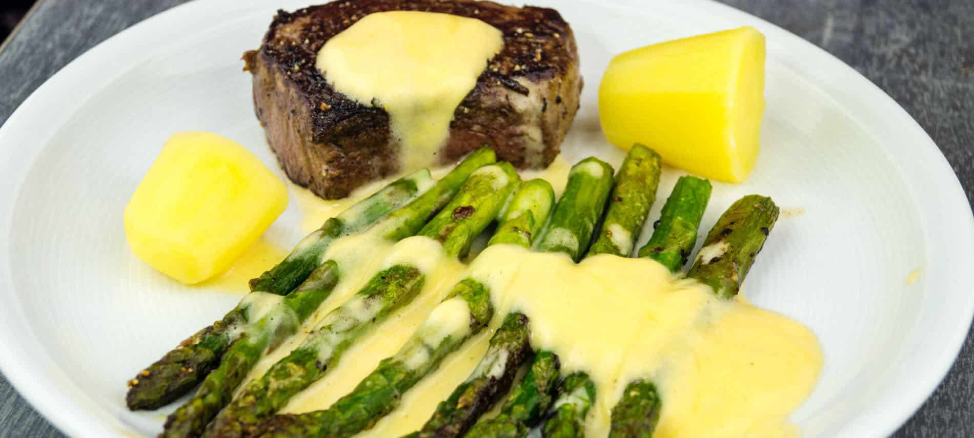 Decaent Bernaise Sauce over Meat and Asparagus