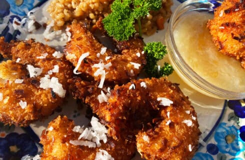 Crispy Golden Fried Coconut Shrimp with a yellow pina colada dipping sauce