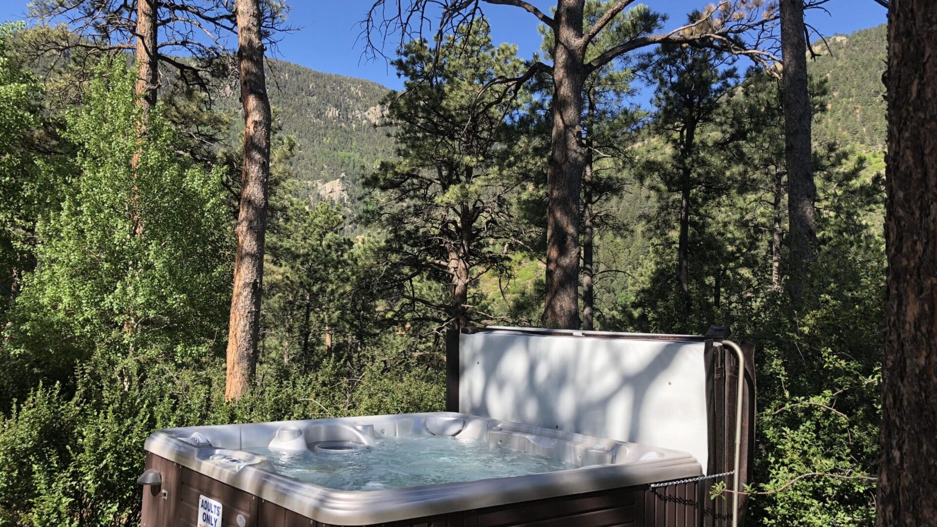 outdoor hot tub with mountain views