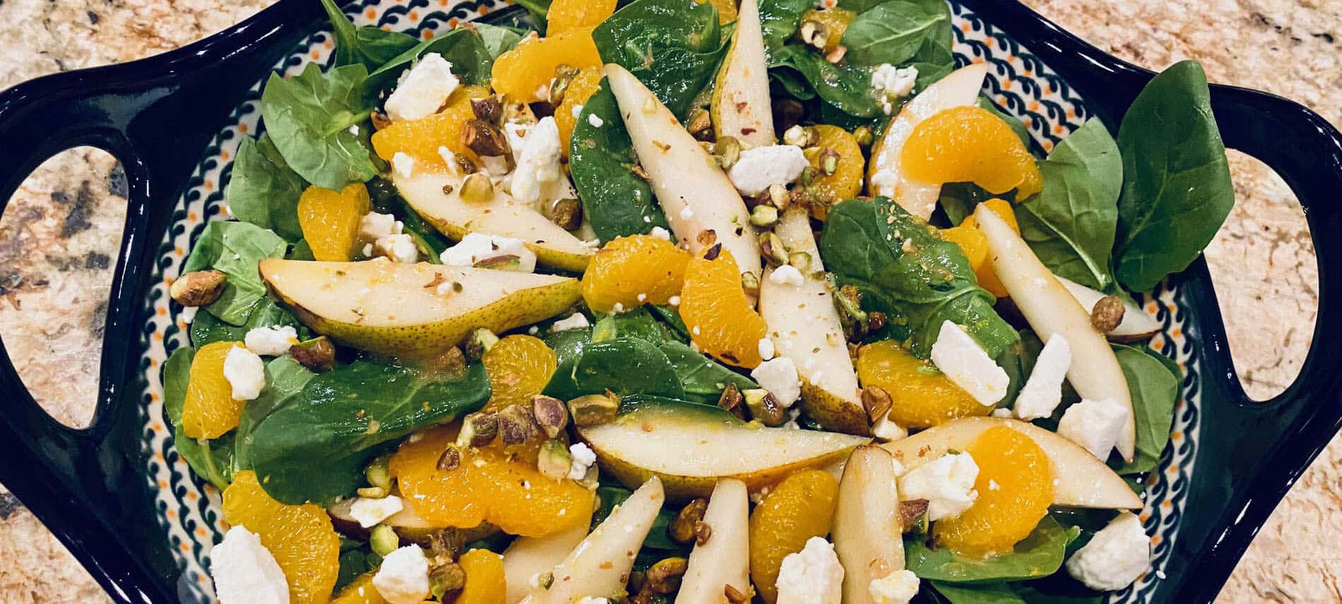 Irish Flag Salad with spinach, pear slices, mandarin oranges, feta cheese and pistachios