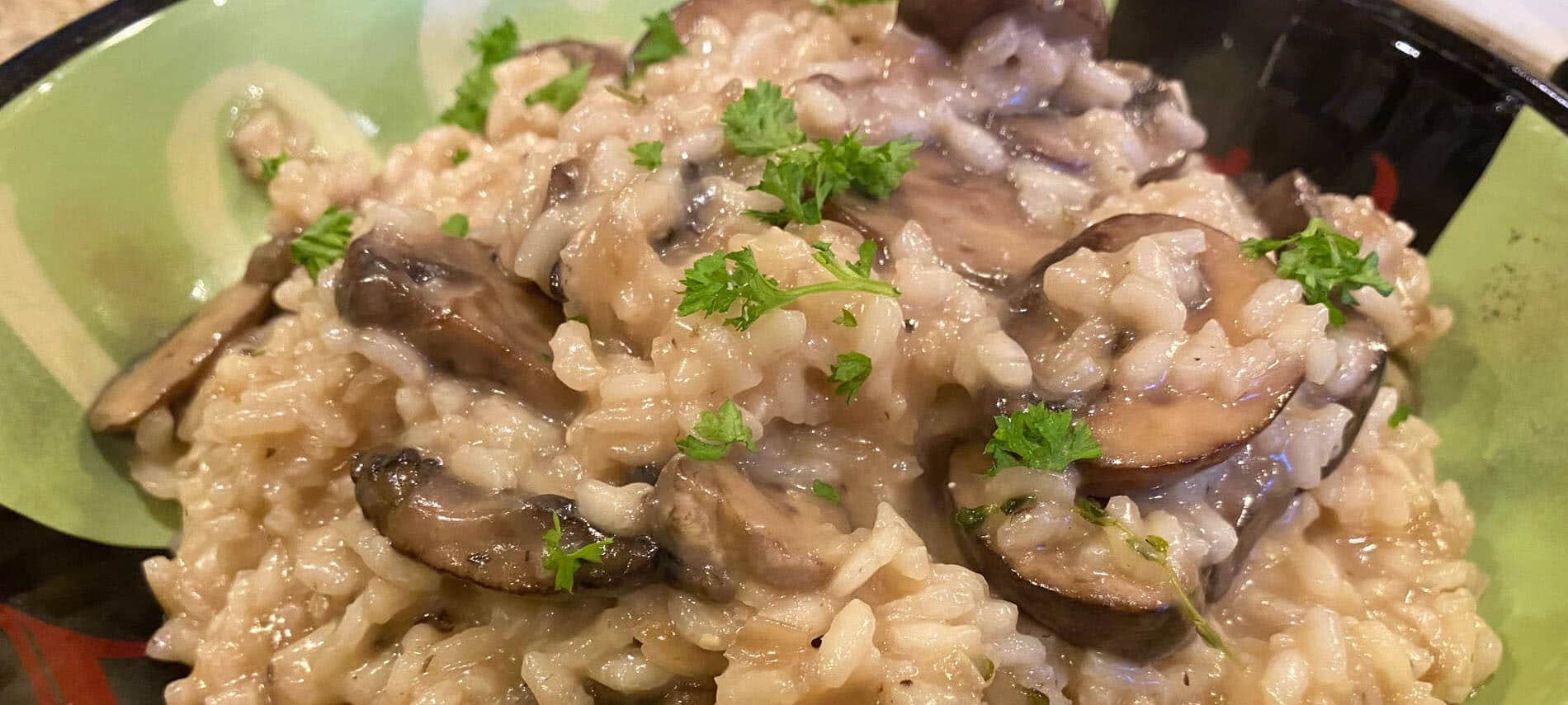 Creamy Risotto with Mushrooms garnished with parsley