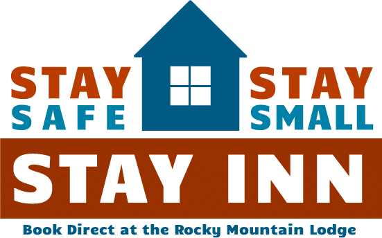 Blue House with red and blue wording saying Stay Safe, Stay Small, Stay Inn at Rocky Mountain Lodge