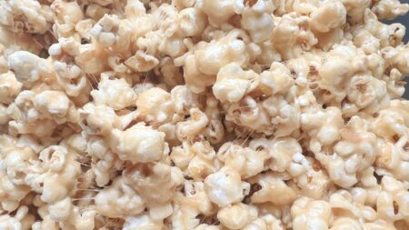 popcorn covered in a sticky gooey marshmallow sauce