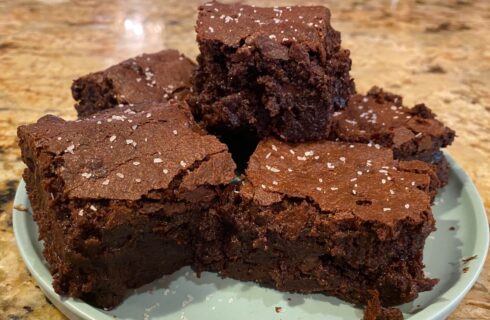 rich chocolate brownies with sprinkles of sea salt on top.